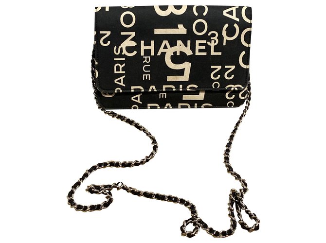 Chanel Pochettes Cuir Toile Noir Beige  ref.248407