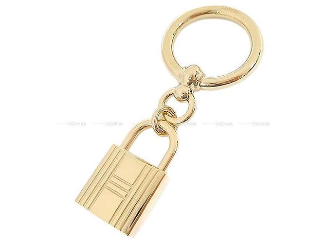 Hermès HERMES cachecol anel loop charms cadenas banhado a ouro Dourado