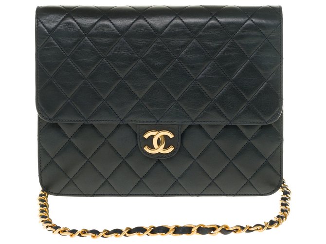 Timeless Chanel Classique Handtasche aus schwarzem gestepptem Lammfell, garniture en métal doré Leder  ref.250030