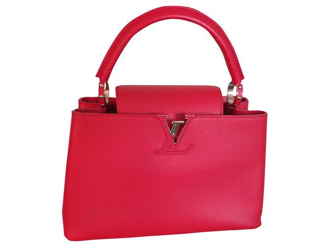 Louis Vuitton handbag Capucines PM in red / rubis Leather ref