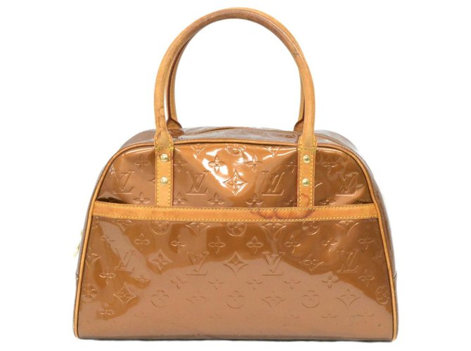 Tompkins square cloth handbag Louis Vuitton Brown in Cloth - 29472317