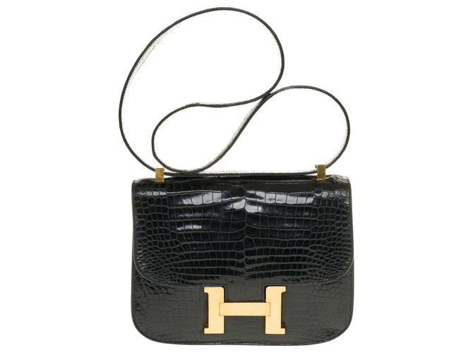 Splendida borsa a tracolla Hermès Constance in coccodrillo Porosus nero, finiture in metallo placcato oro Pelli esotiche  ref.251978
