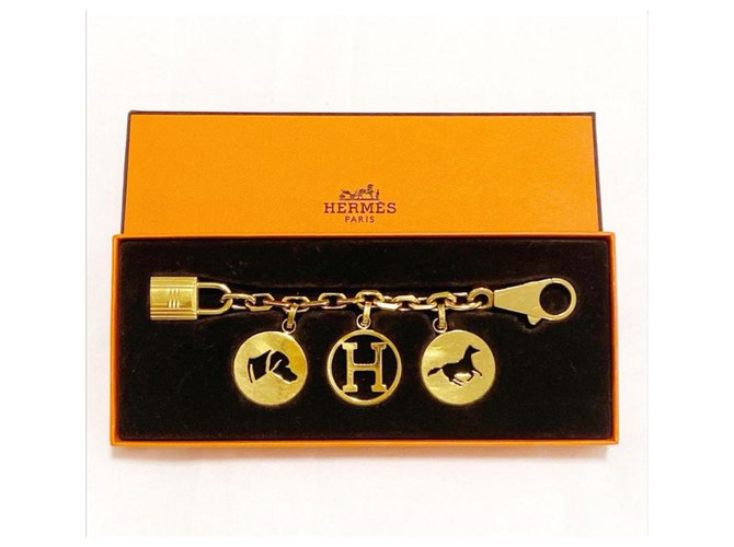 Hermès Rare breloque sac Hermes Gold Breloque Métal Bijouterie dorée  ref.252594