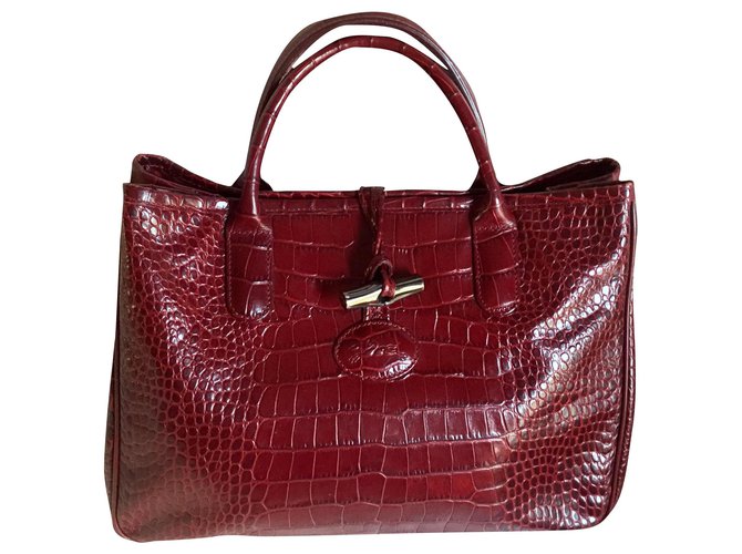 Roseau Longchamp BORDEAUX CROCO SHAPED calf leather BAG Dark red  ref.253706