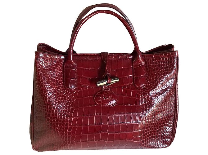 Roseau Longchamp BOLSO BURDEOS CON FORMA DE CRUZ