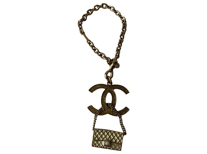 Chanel Bag charms White Golden Metal  ref.256825