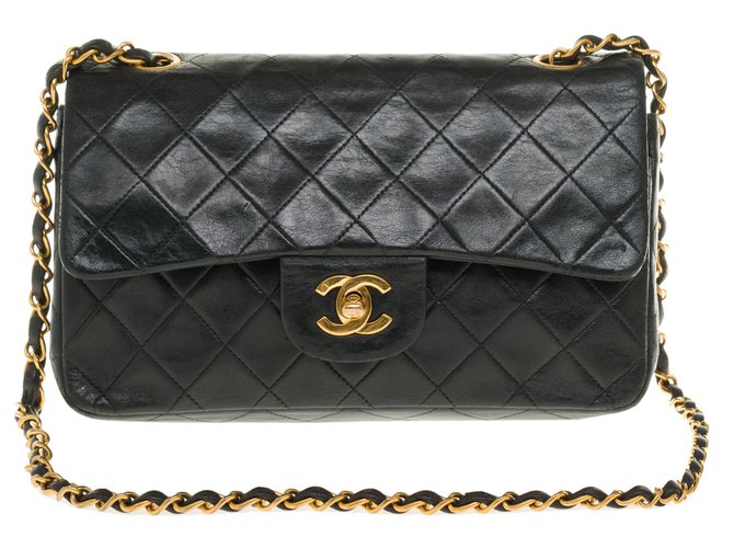 Timeless Bolsa Chanel atemporal / clássica excelente 23cm em couro preto acolchoado, garniture en métal doré  ref.257079