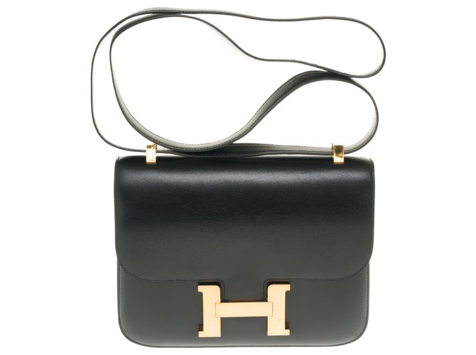 Splendide Hermès Constance en cuir box noir, garniture en métal doré en superbe état  ref.257089