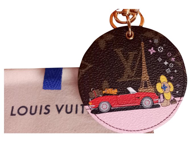 Louis Vuitton bijou de sac et porte-clés. Double fonction. Cuir Rouge  ref.257663
