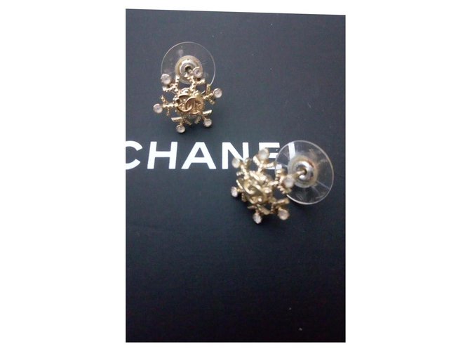 Boucles oreilles flocon Chanel Bijouterie dorée  ref.257926