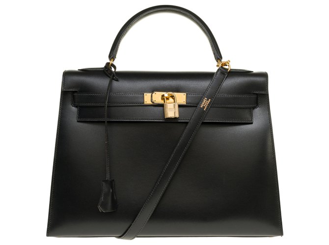 Excepcional bolso de Hermès Kelly 32 correa de sillín en cuero box y adornos de metal dorado Negro  ref.259659