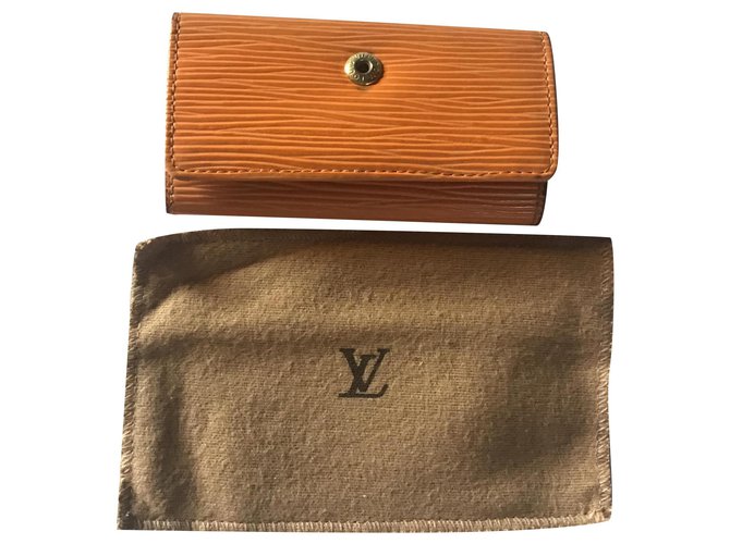 Louis Vuitton Schlüsselhalter Brieftasche Orange Leder  ref.260224