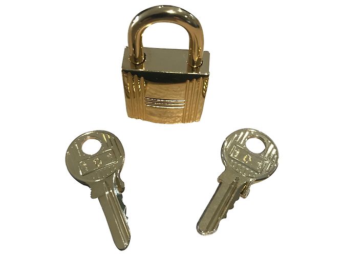 Cadeado de aço dourado Hermès com 2 chaves