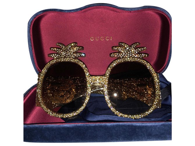 Gucci Des lunettes de soleil Bijouterie dorée  ref.261659