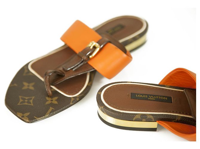 Sandálias de tanga Louis Vuitton Brown Monogram Canvas Orange Leather Voyage 37,5 Marrom Laranja Couro  ref.265374