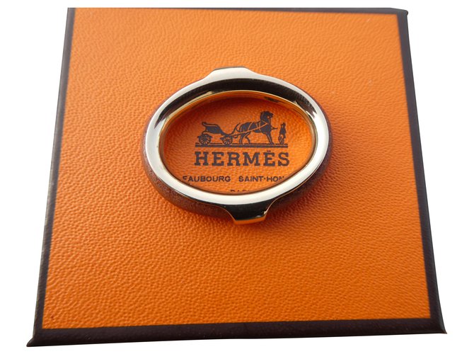 Hermès Schal Ring Kyoto Modell aus Permabrass Stahl und Leder Gold hardware  ref.265265