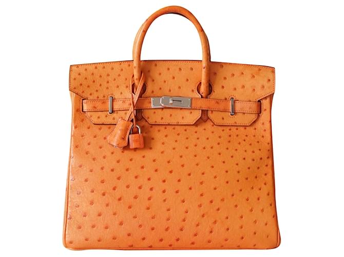Haut à courroies Hermès Borse Arancione Pelli esotiche  ref.266073