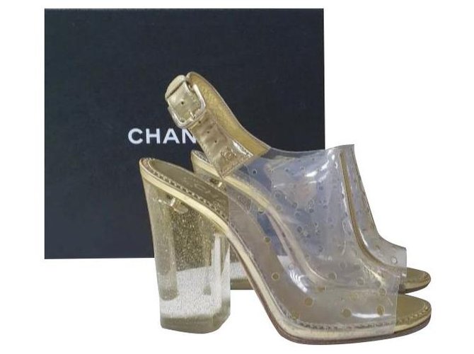 Taille des sandales transparentes Chanel Gold 38,5 Doré  ref.269825