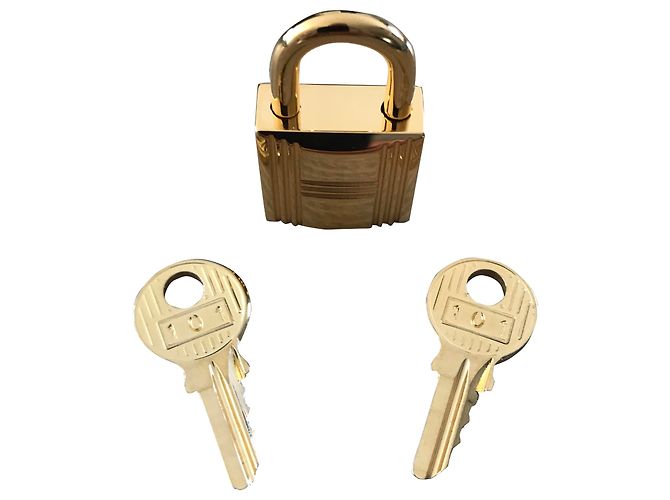 Lucchetto Hermès in acciaio dorato per Kelly e Birkin Gold hardware