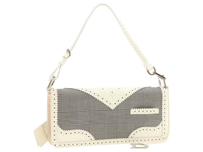 dior charm bolsa