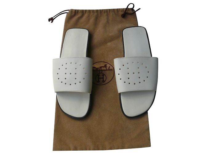 Hermès HERMES Mules cuir blanches neuves H Perforé T37