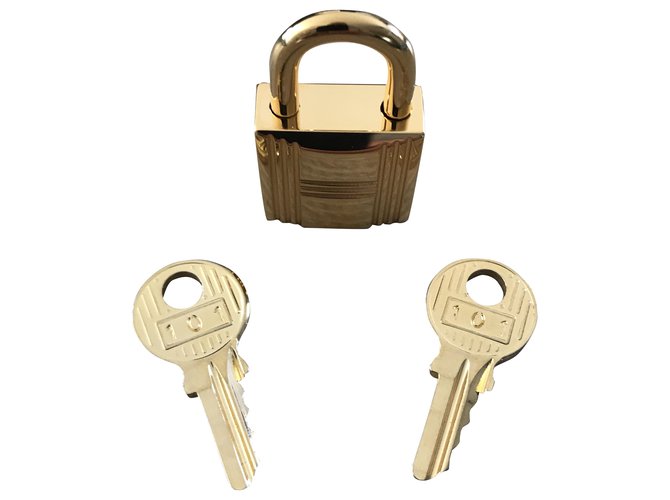 Hermès golden steel padlock for Kelly, birkin bag Gold hardware  ref.272725