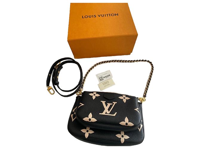 Clutch Louis Vuitton Empreinte Azul Multi-pocket
