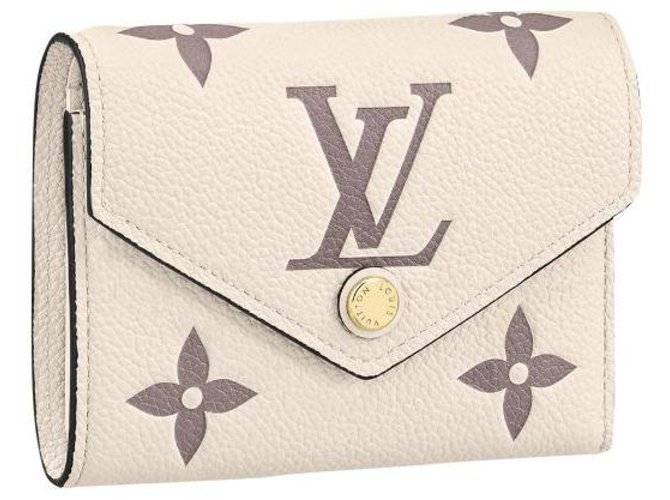 Louis Vuitton Cartera LV Victorine piel empreinte Beige Cuero  ref.274799