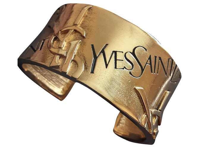 YVES SAINT LAURENT.  cuff. Gold hardware Gold-plated  ref.274801