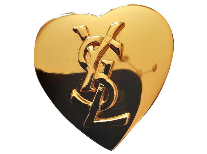 YVES SAINT LAURENT.  "Heart Logo" brooch. Gold hardware Gold-plated  ref.274809