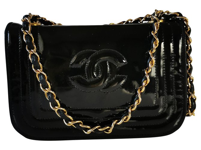 Chanel Mini bolso Negro Charol  ref.303100