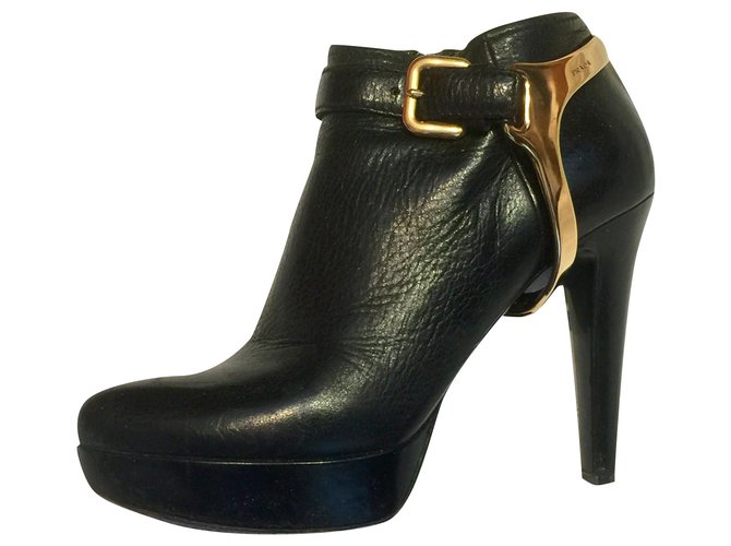 Prada Ankle boots with golden branded stirups (removable) Black Gold hardware Leather Metal  ref.276780