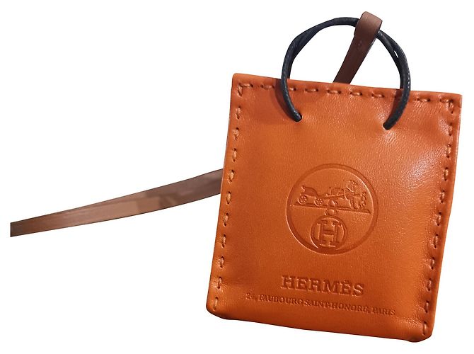 Bijou de sac Hermès Paper Bag Orange Cuir 