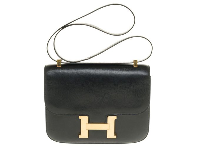 Esplêndida bolsa Hermès Constance 23 couro caixa preta, garniture en métal doré Preto  ref.287160