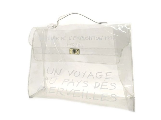 Bolso satchel Hermès Kelly Clear Souvenir De L'exposition de vinilo blanco  ref.289933