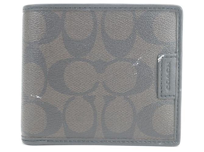 Coach Portafoglio bifold da uomo con monogramma marrone