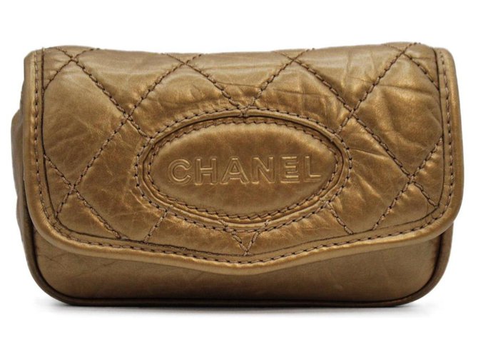 Chanel Bolsas Dourado Couro  ref.296166