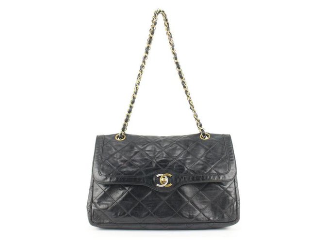 Chanel Bolso clásico con solapa de cadena CC de piel de cordero acolchado negro excepcional Cuero  ref.297521