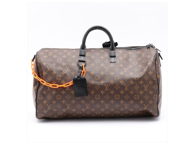 Louis Vuitton Blue Monogram Coated Canvas And Taiga Leather Keepall  Bandoulière 50 Silver Hardware, 2020 Available For Immediate Sale At  Sotheby's