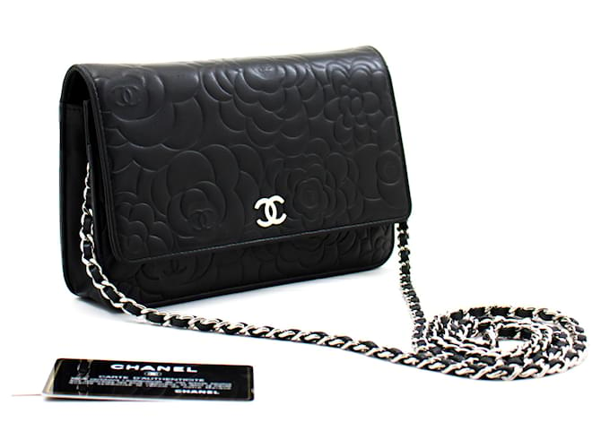CHANEL Black Camellia Embossed Wallet On Chain WOC Umhängetasche Schwarz Leder  ref.300828