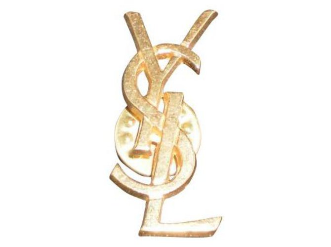 Yves Saint Laurent broche pin's vintage yves st laurent comme neuve avec pochette Métal Doré  ref.301373
