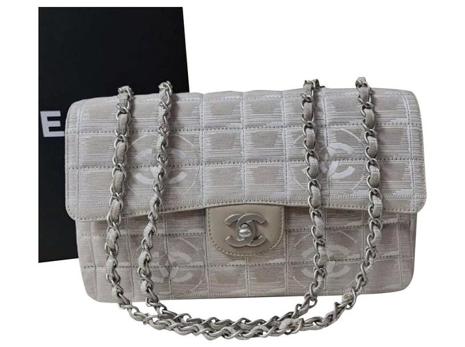 chanel logo flap bolsa