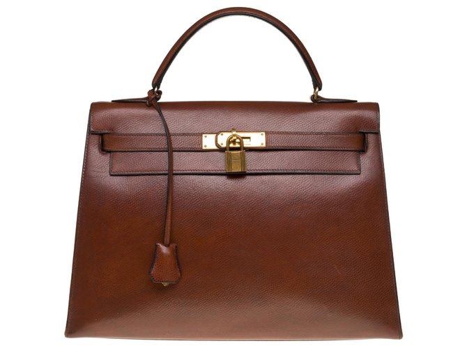 Superbe sac Hermès Kelly 32 sellier en cuir Courchevel marron, garniture en métal plaqué or  ref.304564