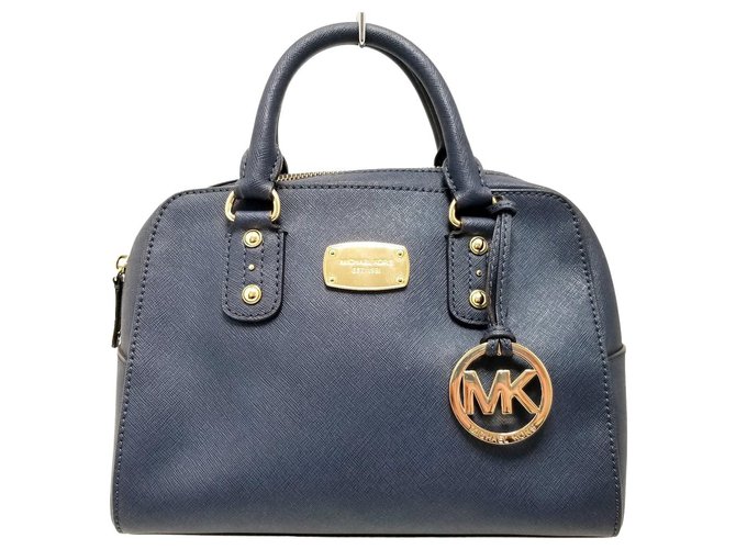 Leather clutch bag Michael Kors Navy in Leather - 31159724