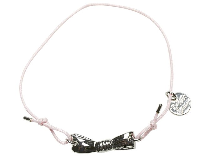 Bracelet à breloques logo rose Dior Métal Nylon Tissu  ref.305726