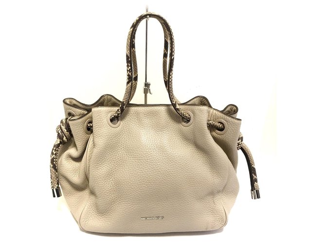 Cream colored deals michael kors purse