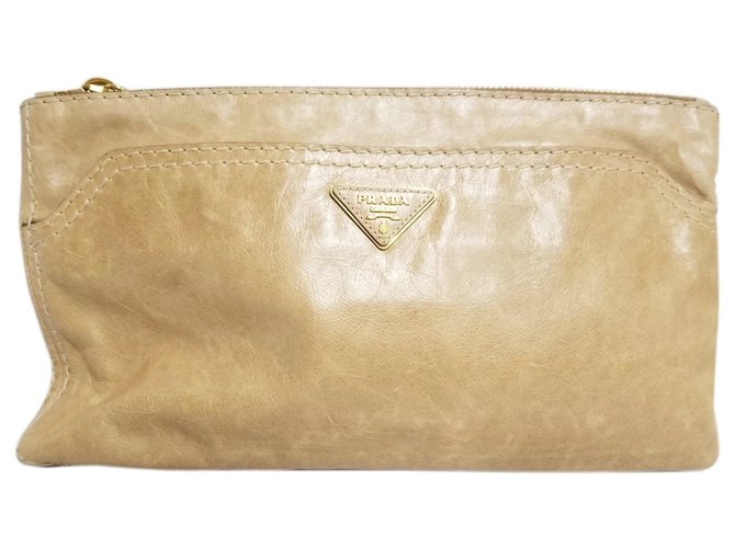 prada beige clutch