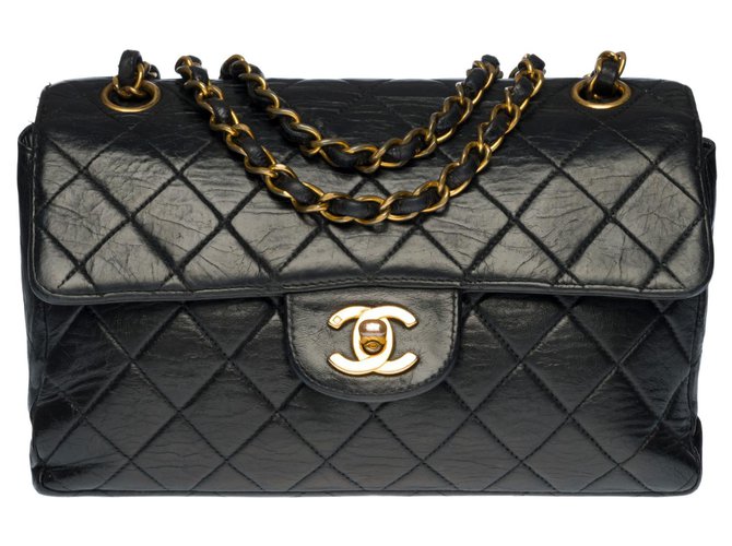 Très RARE sac bandoulière Chanel Timeless/Classique 22cm en cuir matelassé noir avec ouverture par rabat simple double side , garniture en métal doré  ref.307782