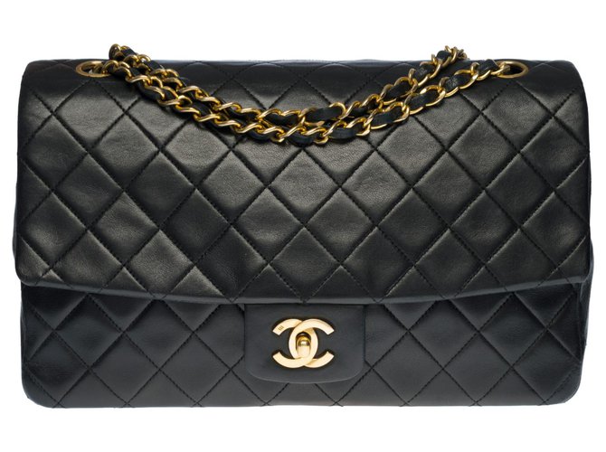 Timeless Exceptional Chanel Classic Handbag 27 cm in black quilted leather, garniture en métal doré  ref.307871
