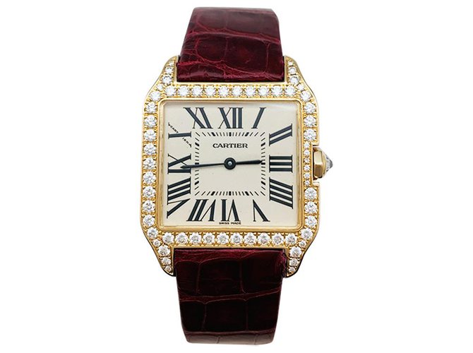 Cartier "Santos Dumont" Uhr in Gold und Diamanten auf Leder. Gelbes Gold  ref.308212